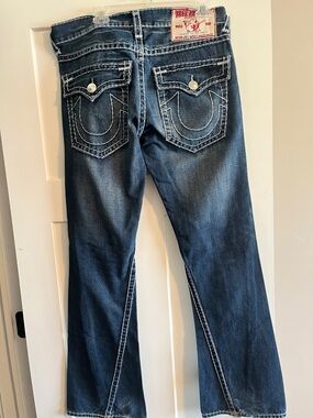True Religion Dark Blue Flare Jeans with Signature Pocket Stitching